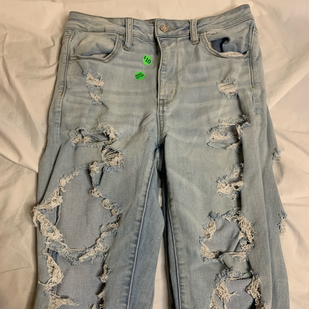 blue ripped jeans